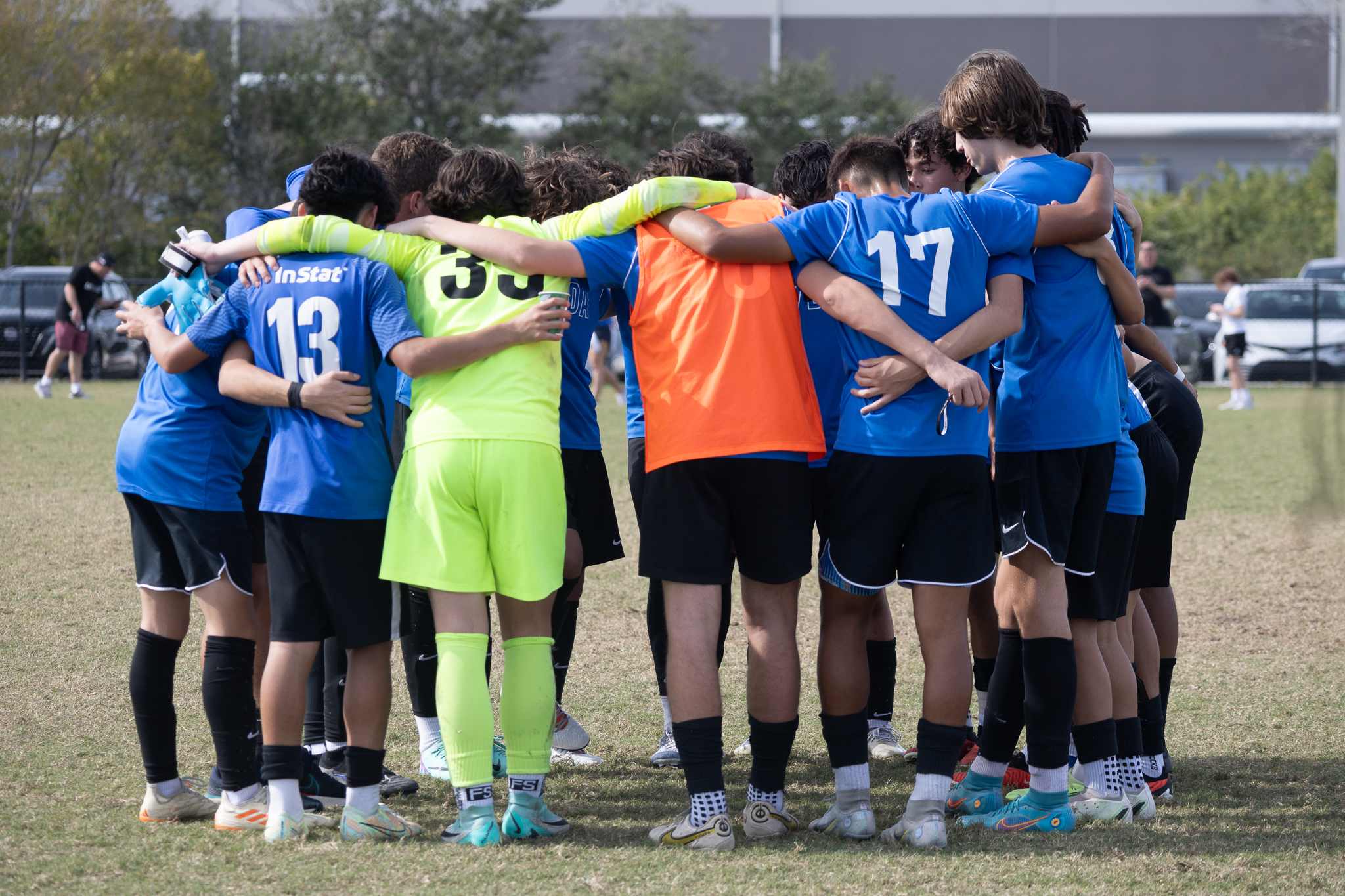 Super Y League players competing in a summer league match